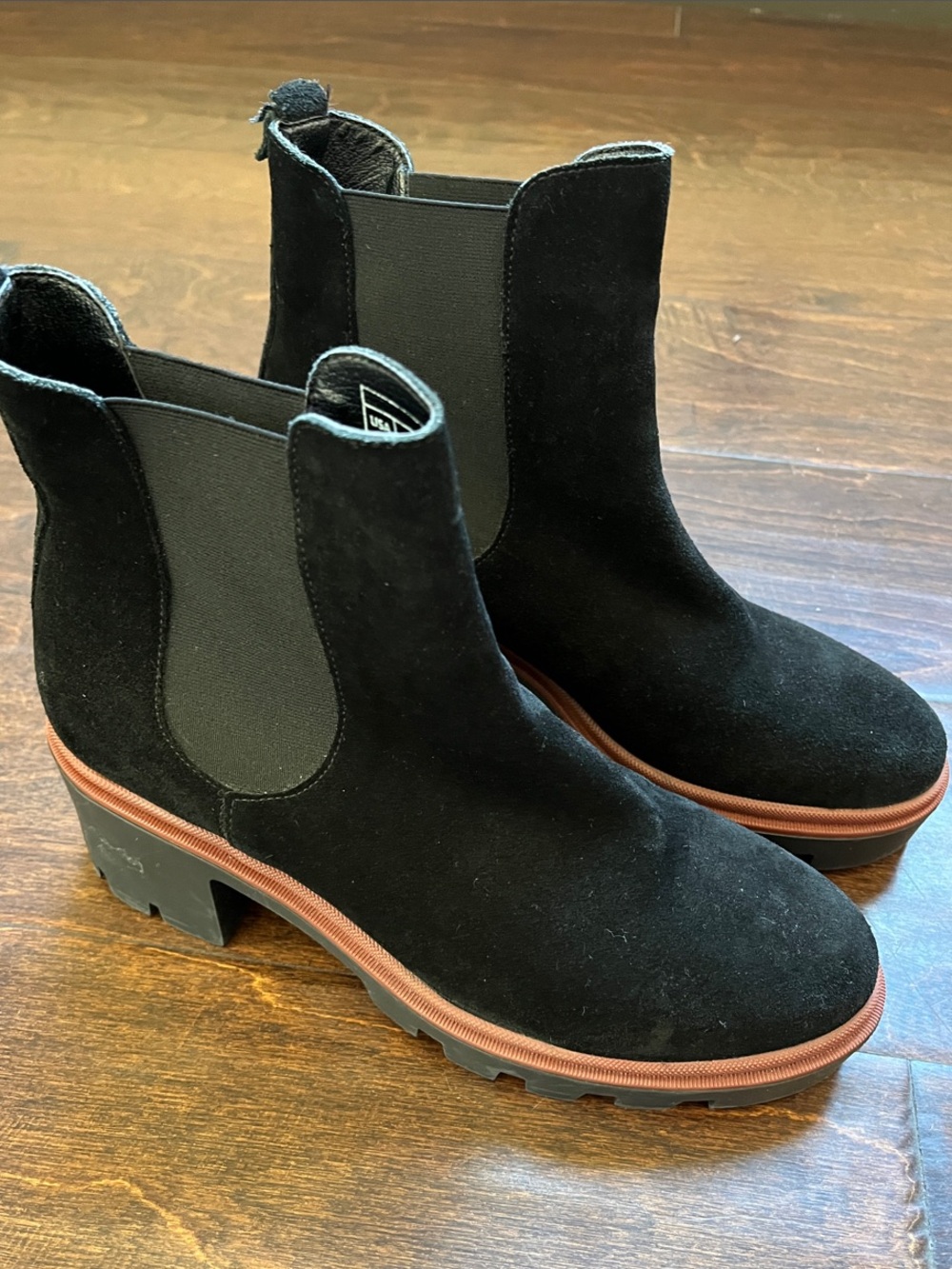 Black Leather Chelsea Boots with Brown Trim and Lug Sole